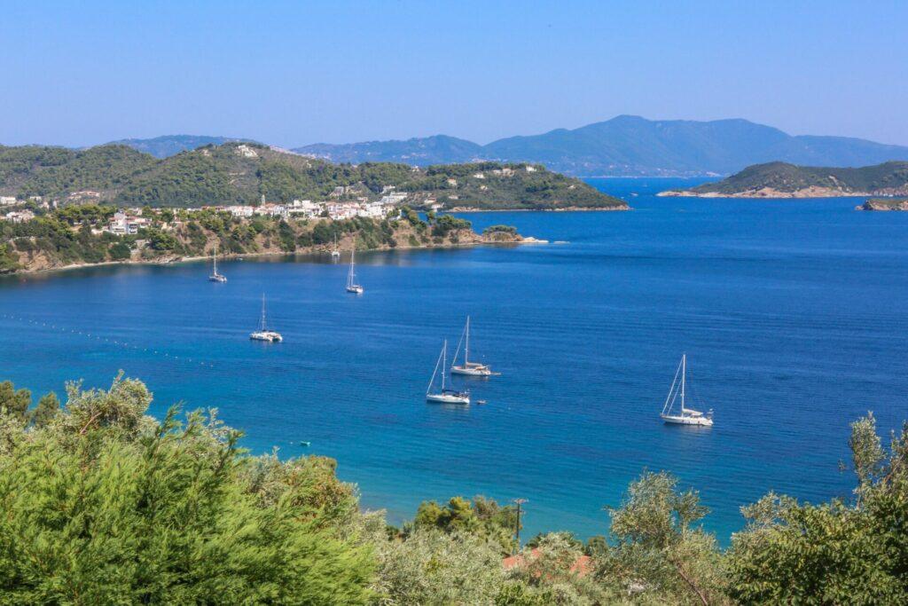 Aerial view of yachts anchored near Skiathos during a supported flotilla in Greece.
