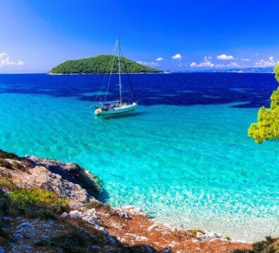Panoramic view of a sailboat anchored at Kastani Beach, Skopelos, famously known from the Mamma Mia! movie.