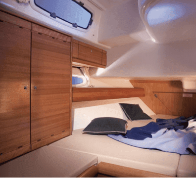 Double cabin interior on a modern charter yacht in Greece.
