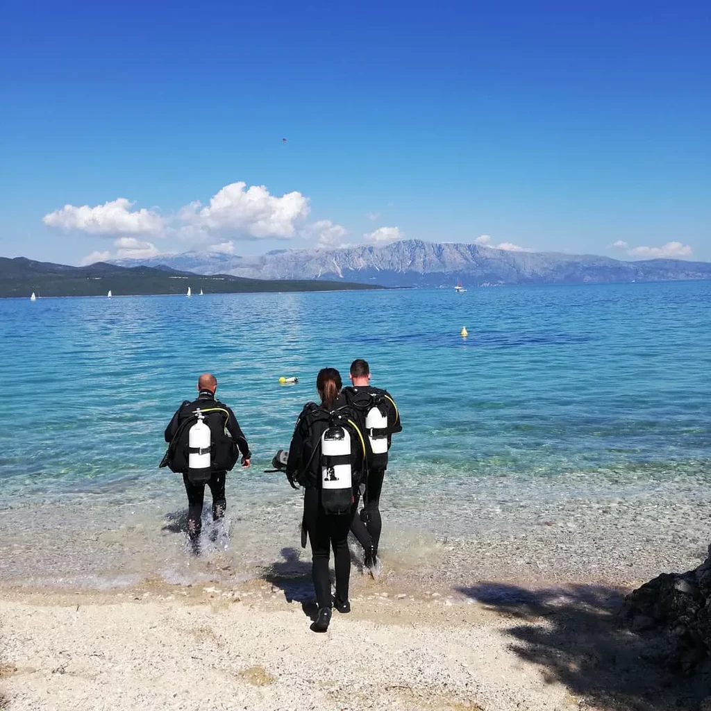 Divers preparing to board a boutique liveaboard for scuba diving and sailing in Greece.