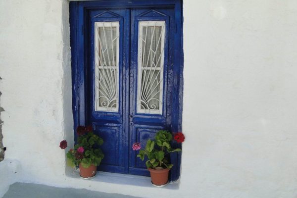 Traditional blue Greek door in Kalamos - Hidden gem Ionian island yacht charters 2026